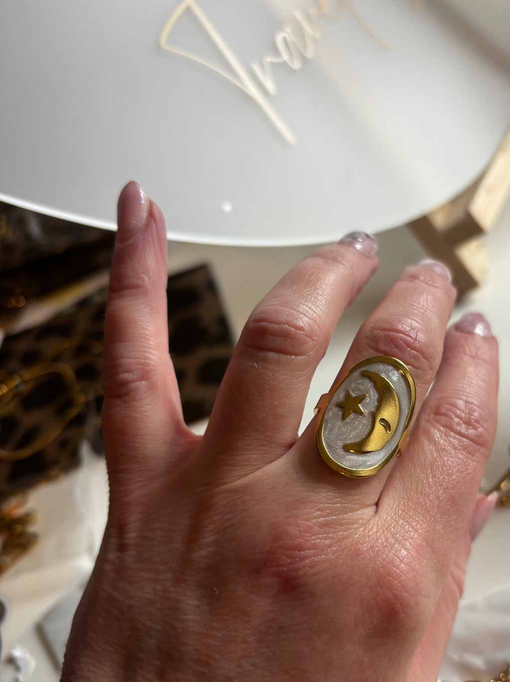 Adjustable moon ring
